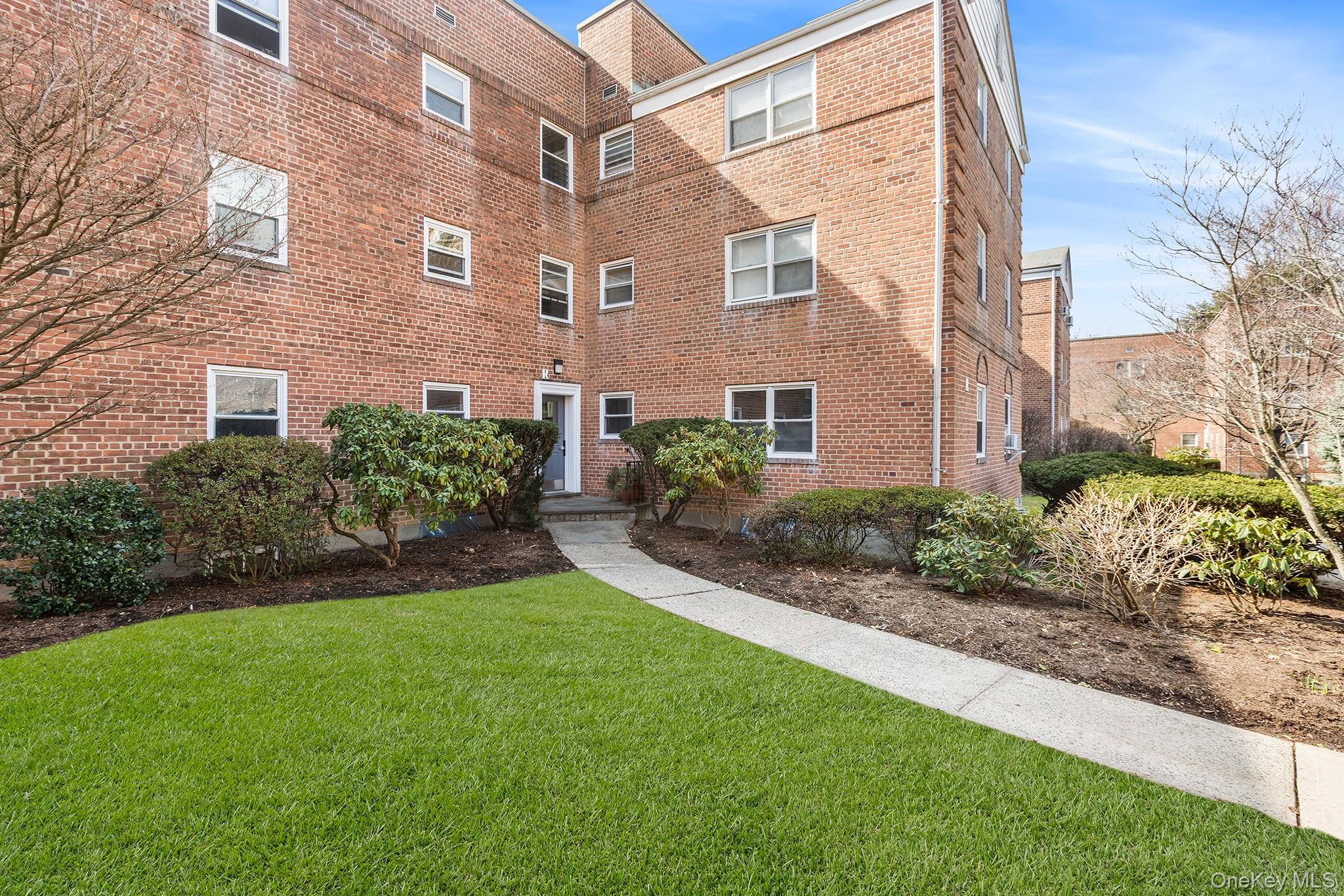 Front of Building with enhanced grass