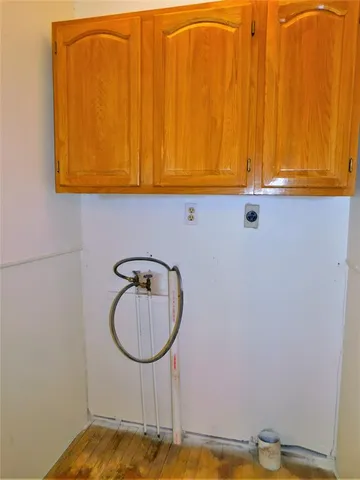 a bathroom with a sink and a window