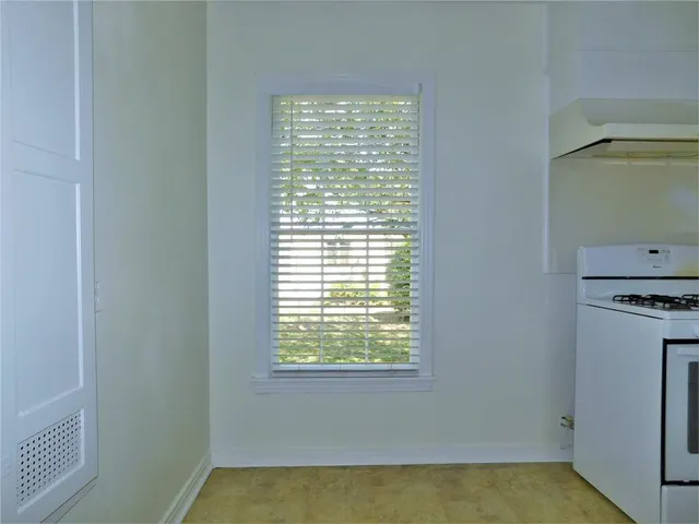 a view of a kitchen with washer and dryer