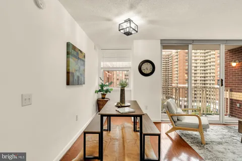 a view of a livingroom with furniture and a table
