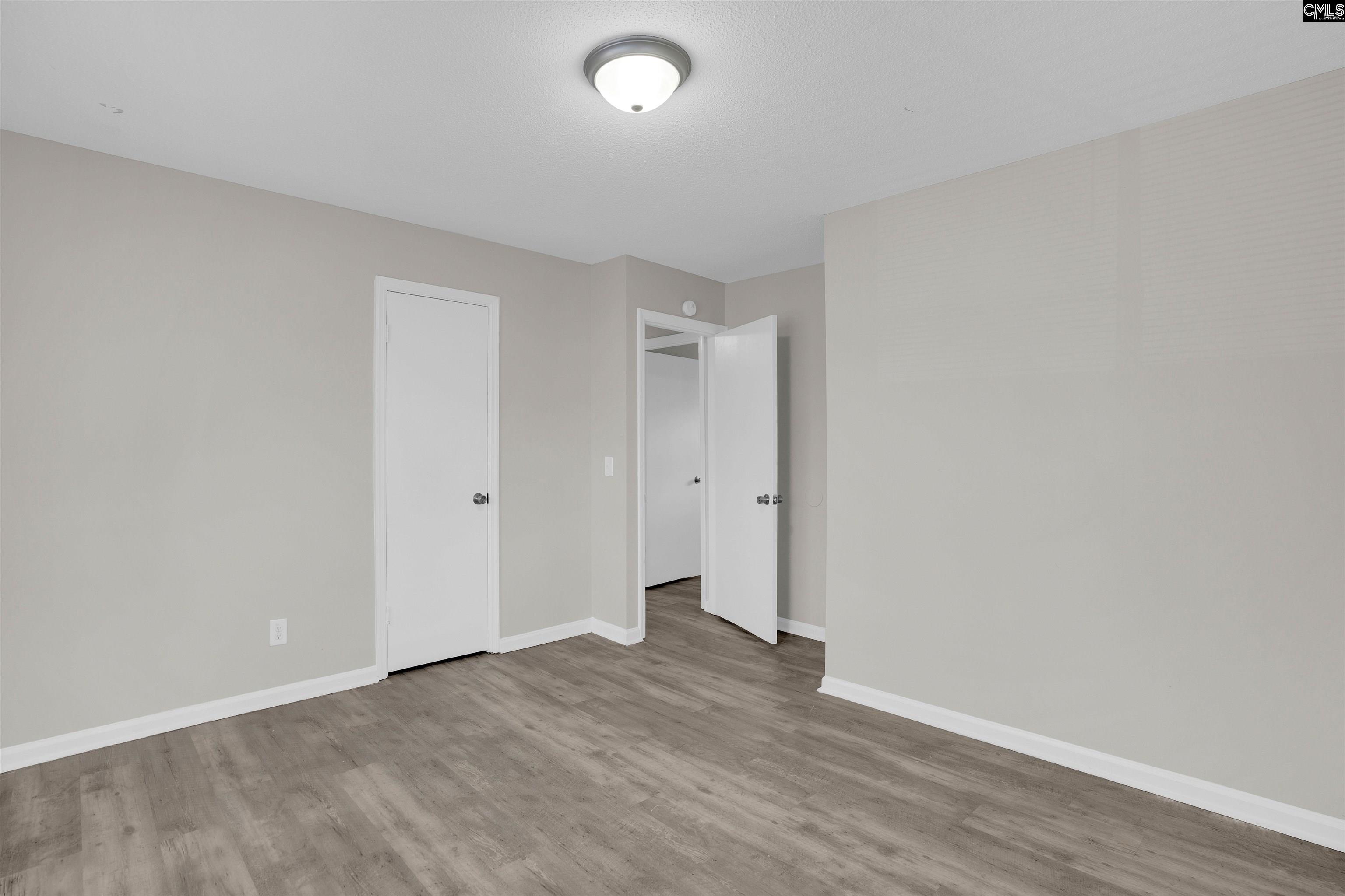 2620 Pleasant Ridge Drive Columbia, SC 29209 - Photo 29 of 37 a view of an empty room and wooden floor