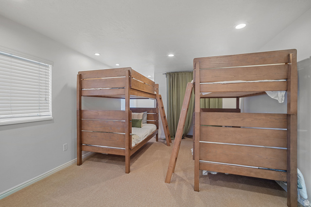 4426 South 3035 East Holladay, UT 84124 - Photo 23 of 49 Unfurnished bedroom with light carpet and recessed lighting