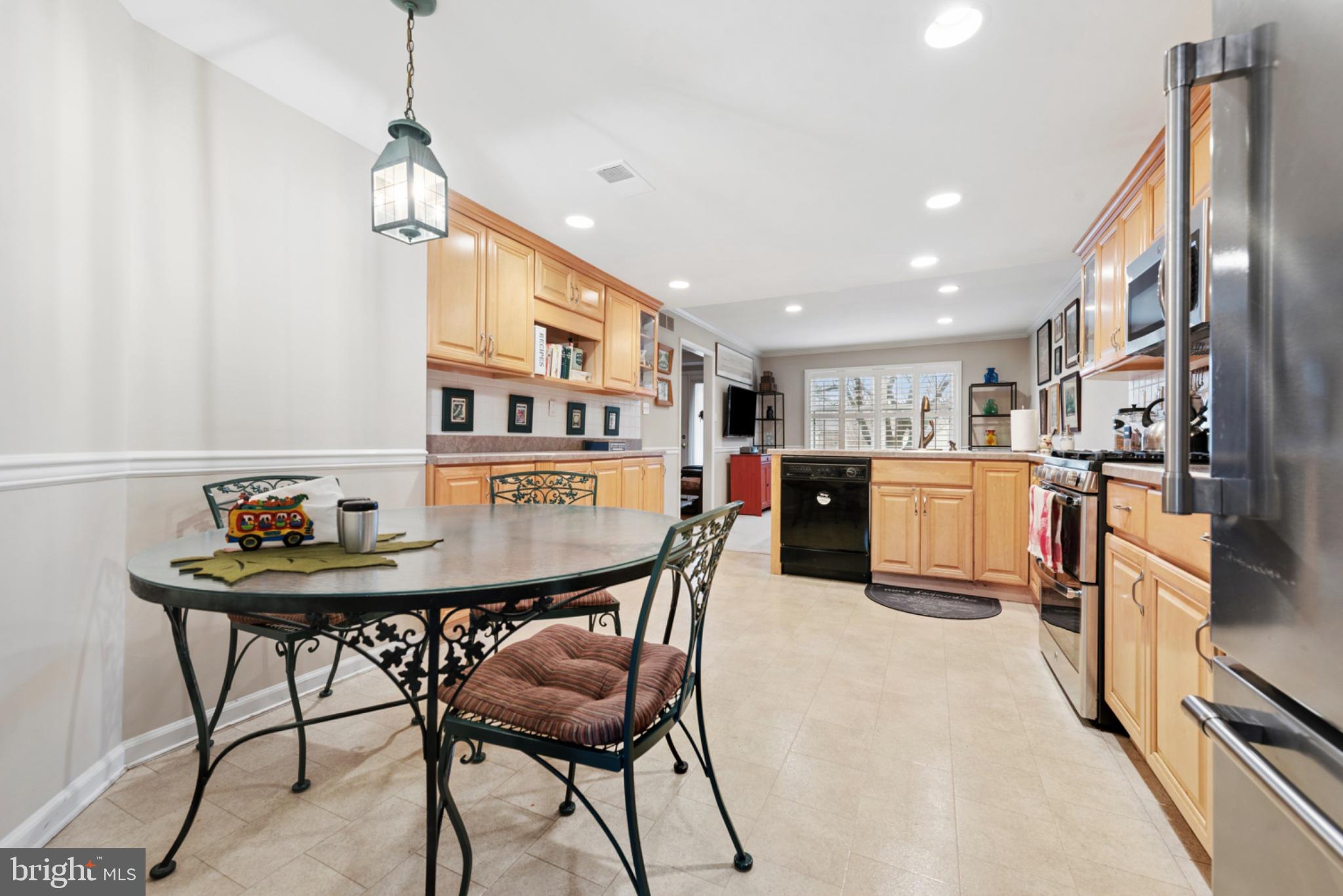 56 Woodstream Drive Chesterbrook, PA 19087 - Photo 12 of 34 Charming kitchen with warm wood accents.
