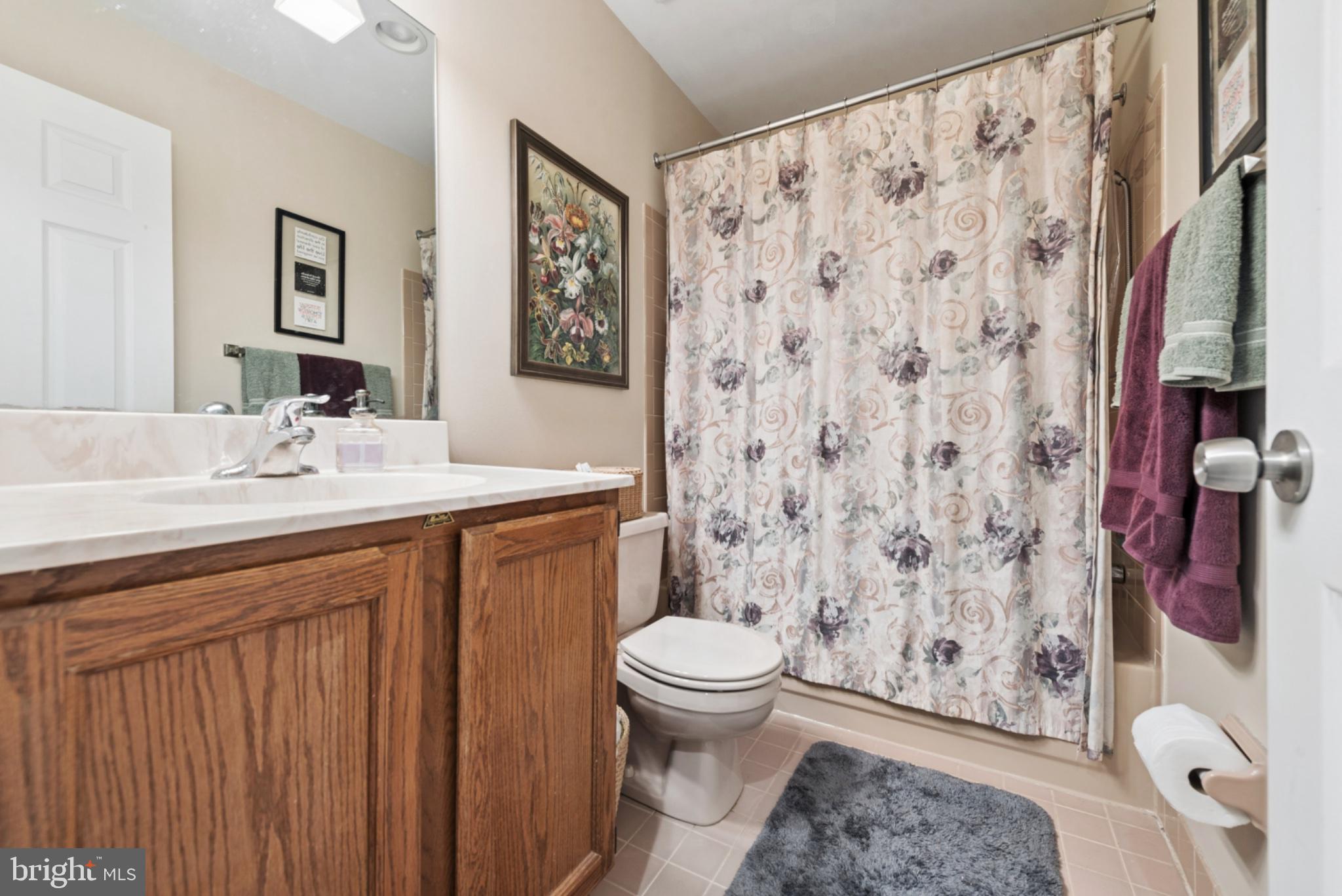 56 Woodstream Drive Chesterbrook, PA 19087 - Photo 20 of 34 Charming bathroom with floral accents.