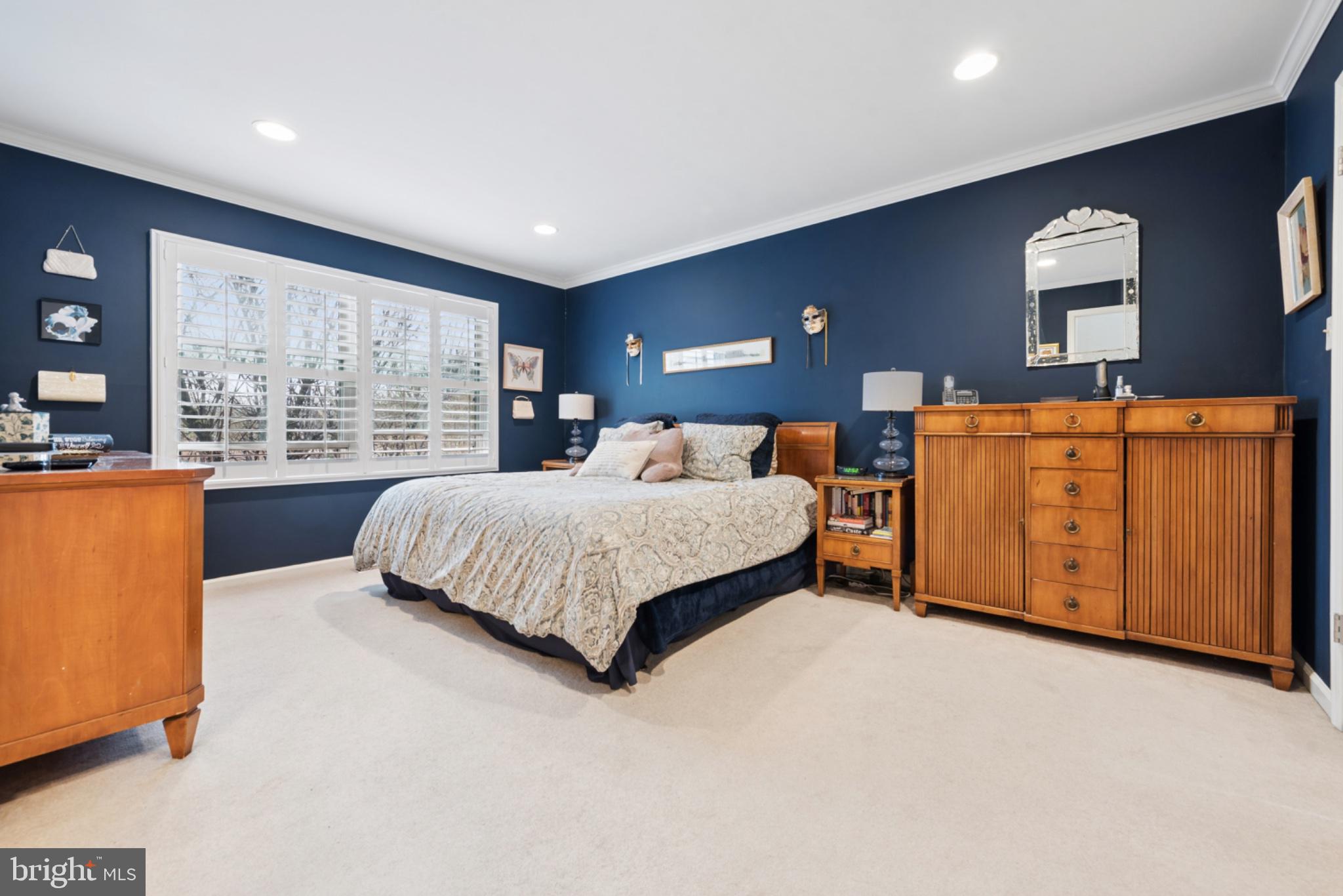 56 Woodstream Drive Chesterbrook, PA 19087 - Photo 21 of 34 Serene bedroom with deep blue walls.