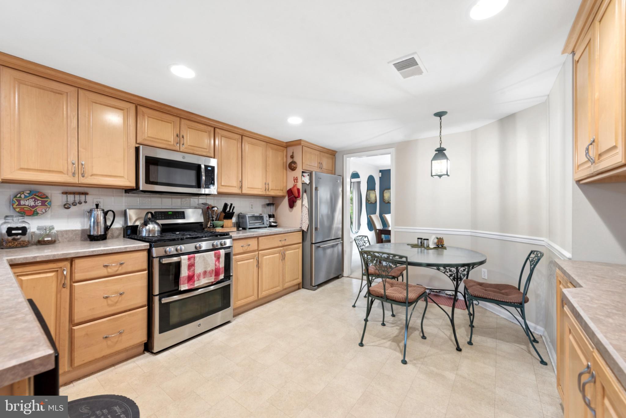 56 Woodstream Drive Chesterbrook, PA 19087 - Photo 9 of 34 Charming kitchen with warm wood tones.