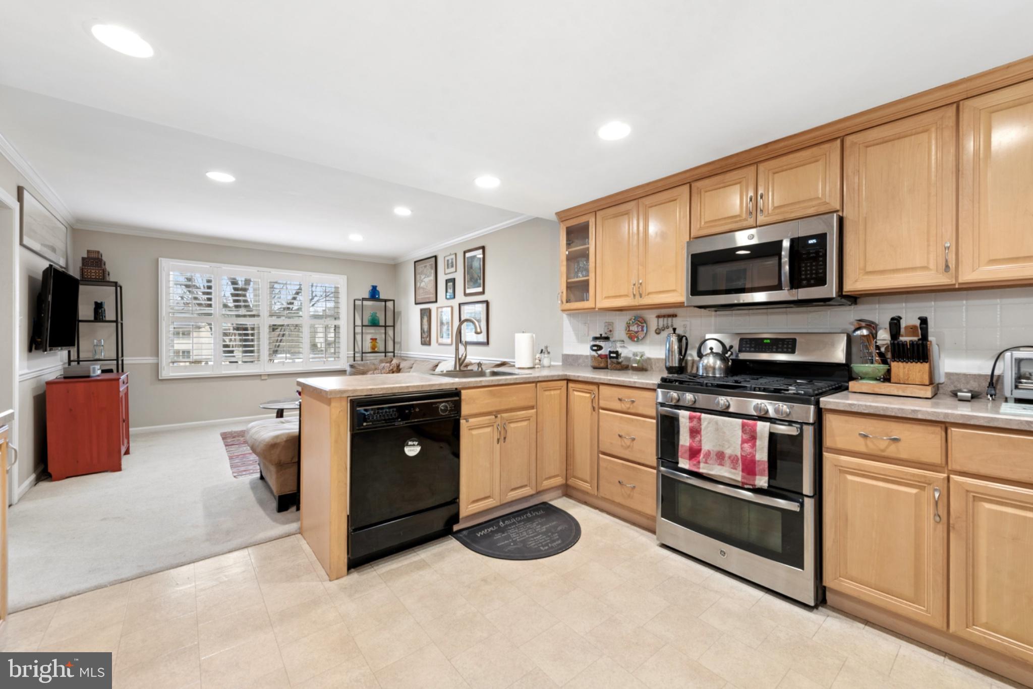 56 Woodstream Drive Chesterbrook, PA 19087 - Photo 10 of 34 Modern kitchen with warm wood tones.
