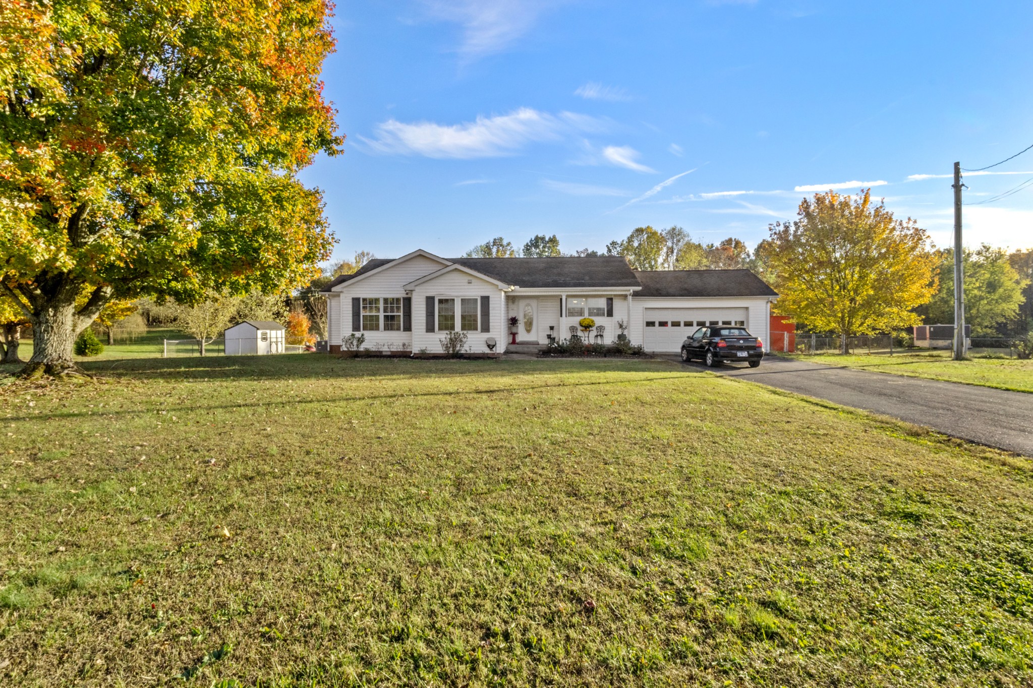 a view of a house with a big yard