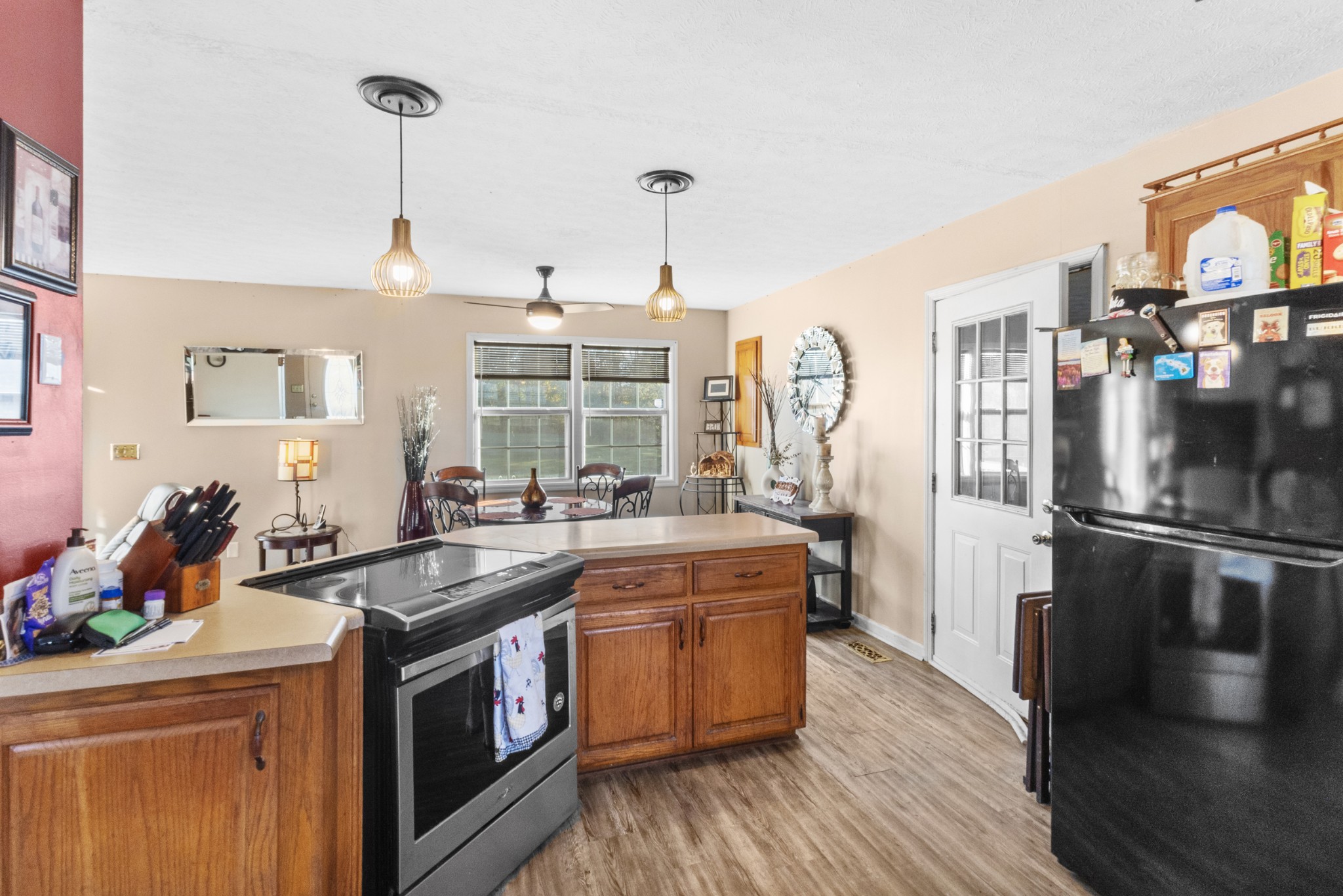 580 Gregory Road Westmoreland, TN 37186 - Photo 19 of 45 a kitchen that has a sink stove and cabinets