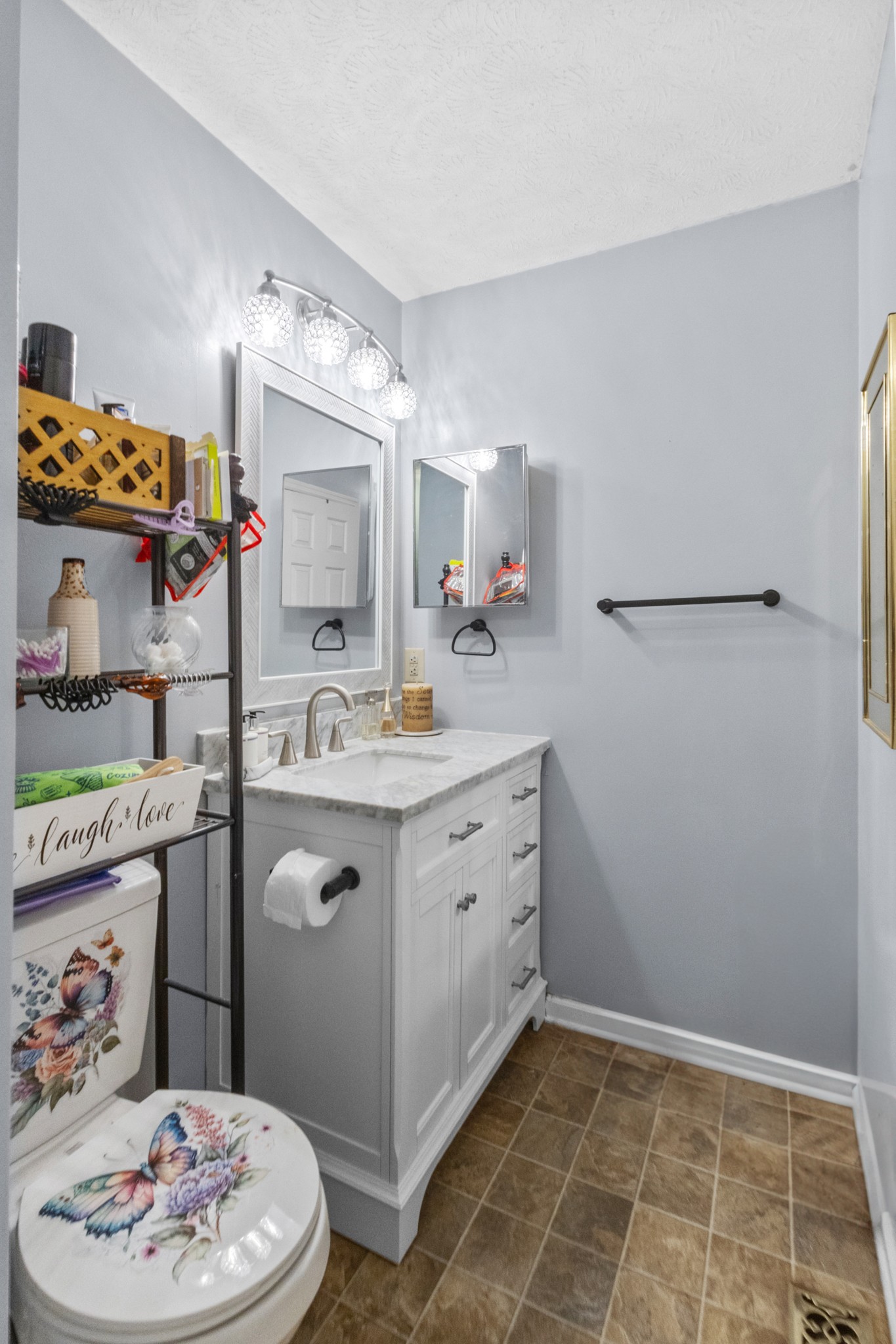 580 Gregory Road Westmoreland, TN 37186 - Photo 23 of 45 a kitchen with a sink and cabinets