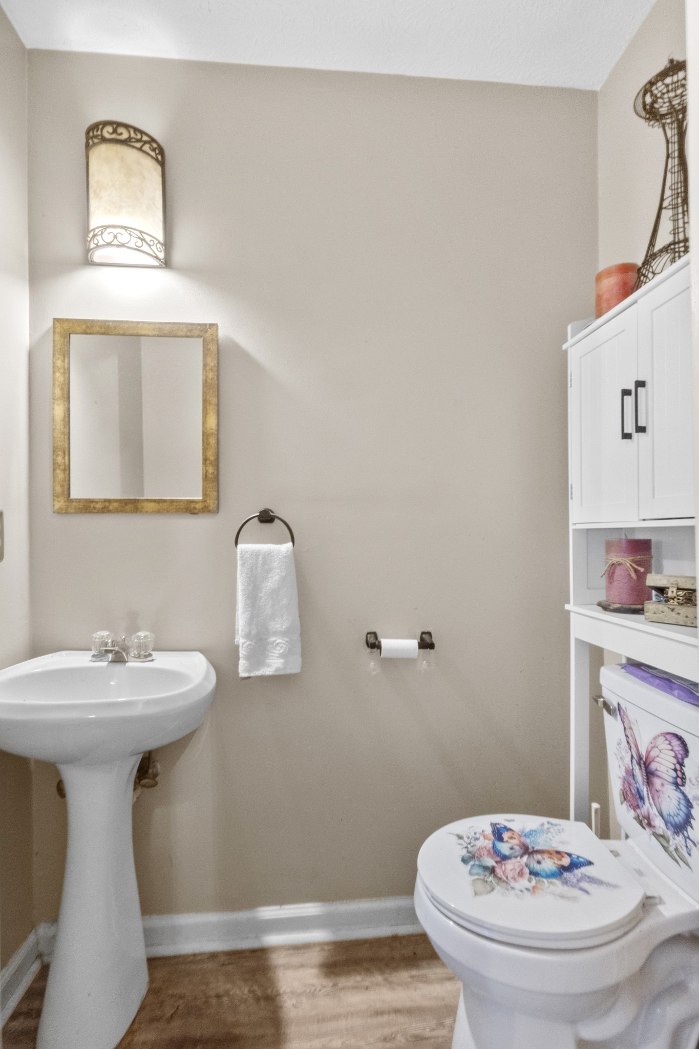 580 Gregory Road Westmoreland, TN 37186 - Photo 25 of 45 a bathroom with a sink toilet and a mirror