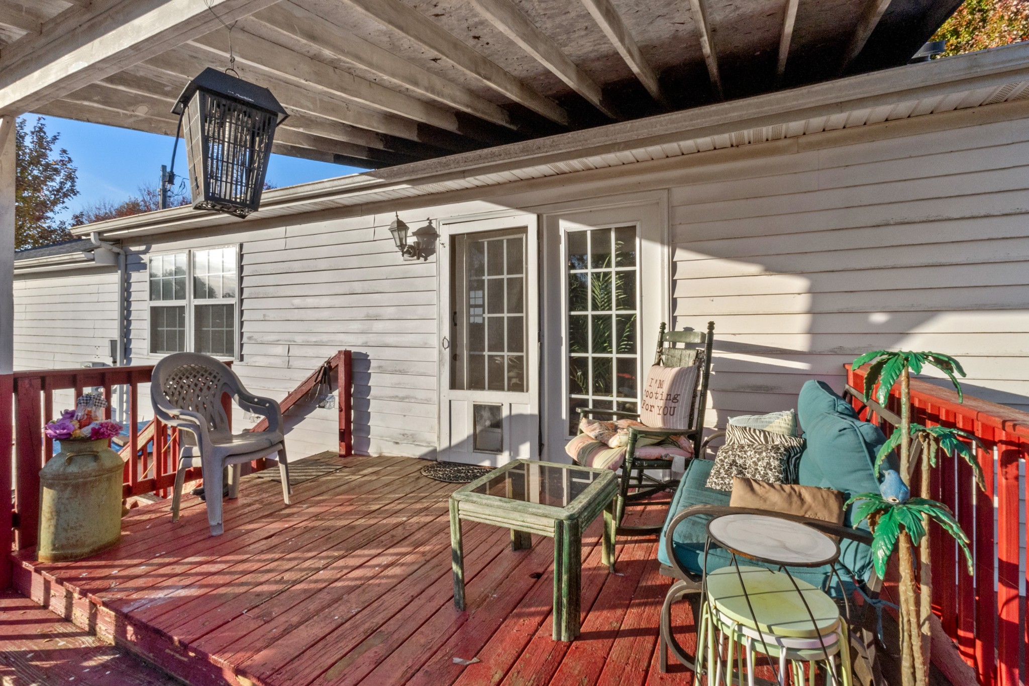 580 Gregory Road Westmoreland, TN 37186 - Photo 33 of 45 a outdoor living space with furniture and wooden floor