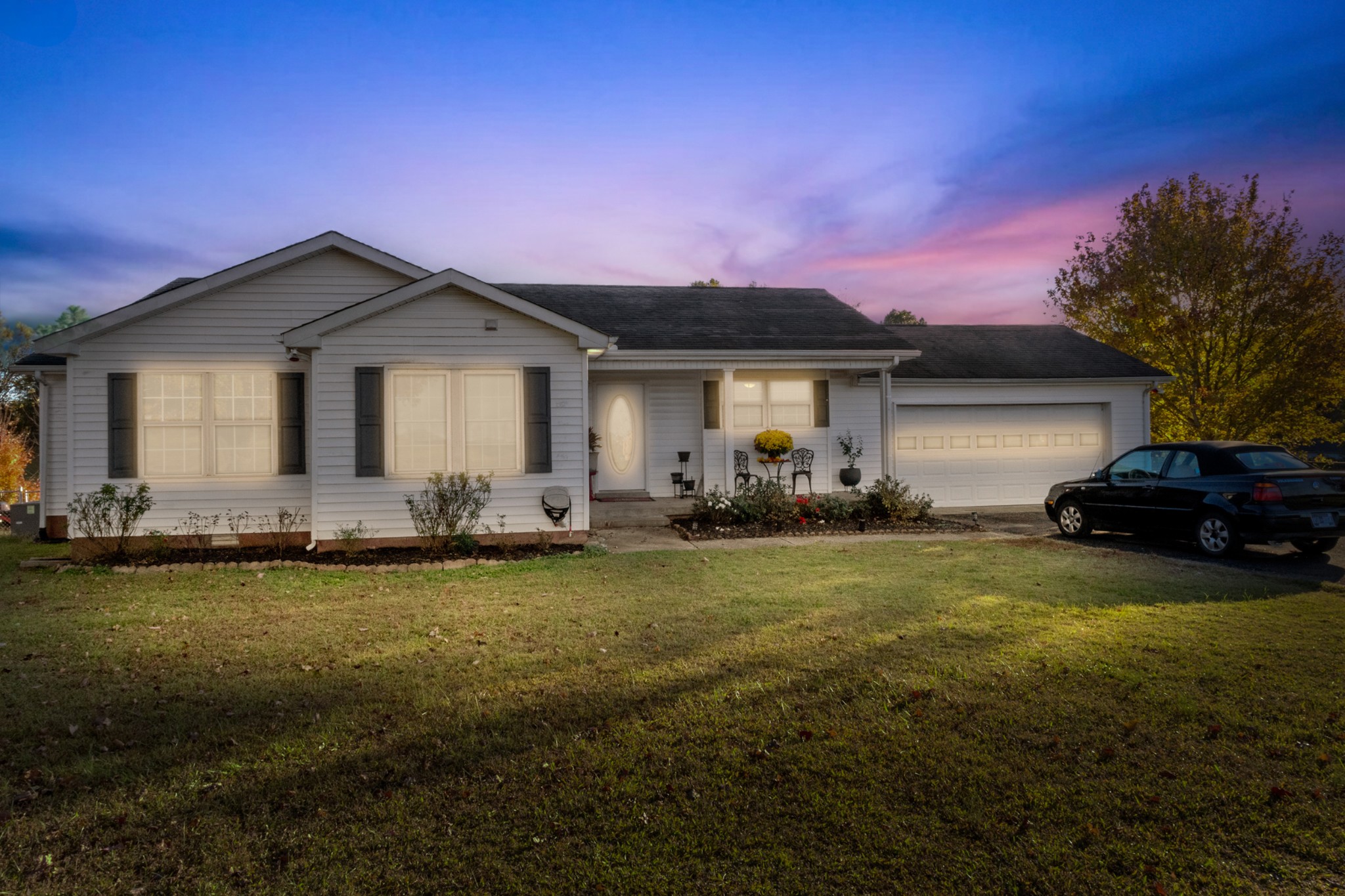 580 Gregory Road Westmoreland, TN 37186 - Photo 4 of 45 a front view of a house with patio