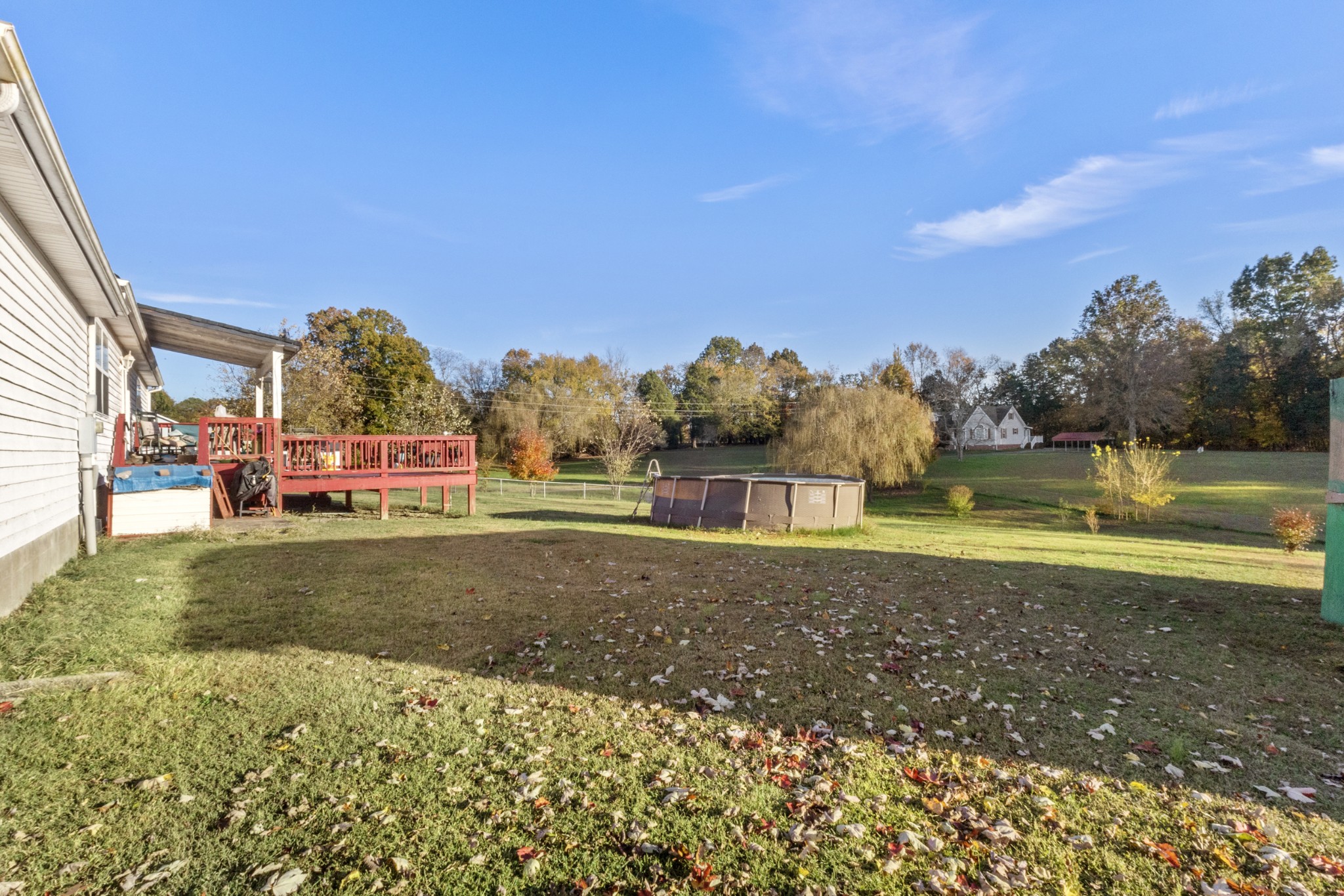 580 Gregory Road Westmoreland, TN 37186 - Photo 44 of 45 a view of a garden with large trees