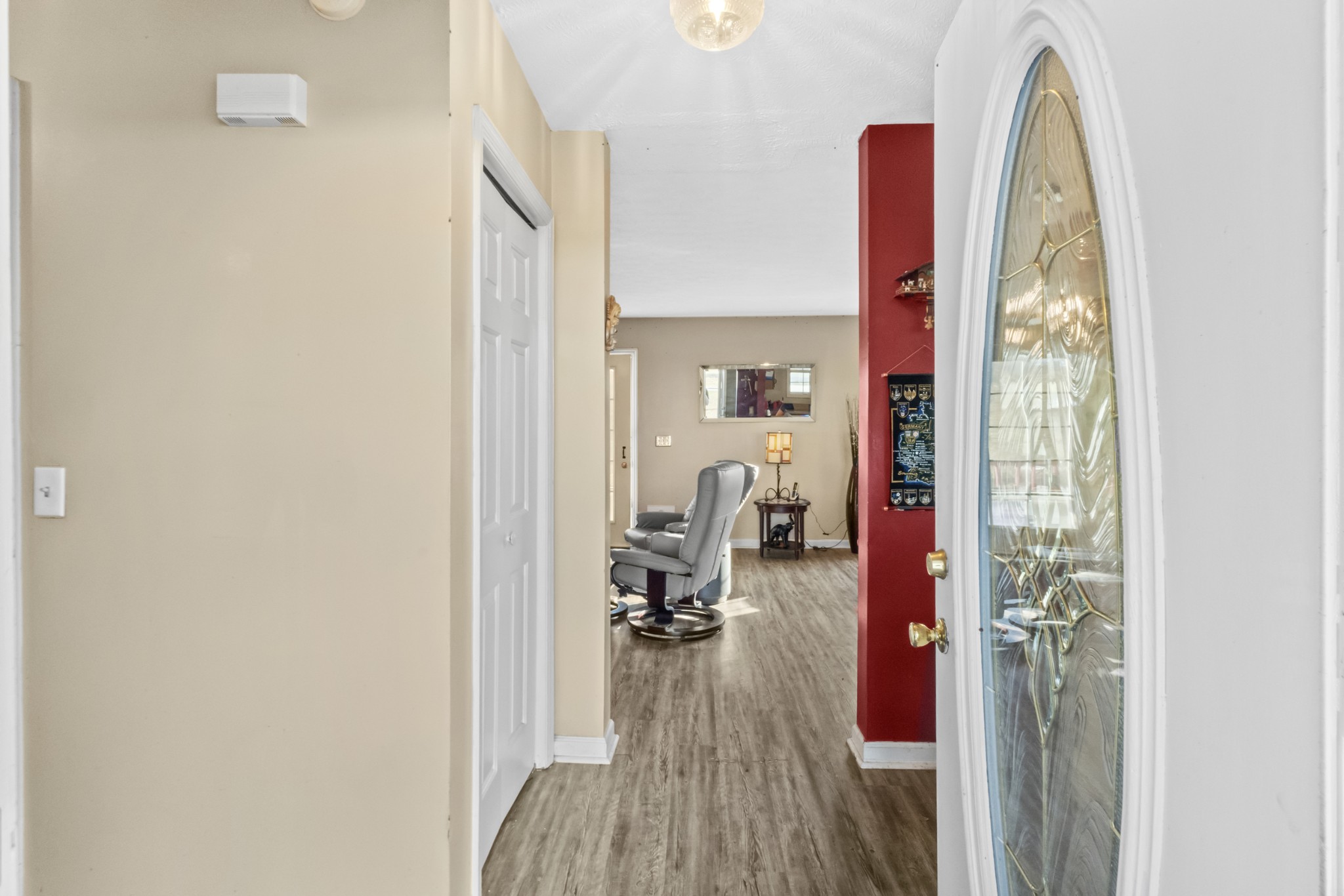 580 Gregory Road Westmoreland, TN 37186 - Photo 8 of 45 a view of a bedroom with a bed and wooden floor