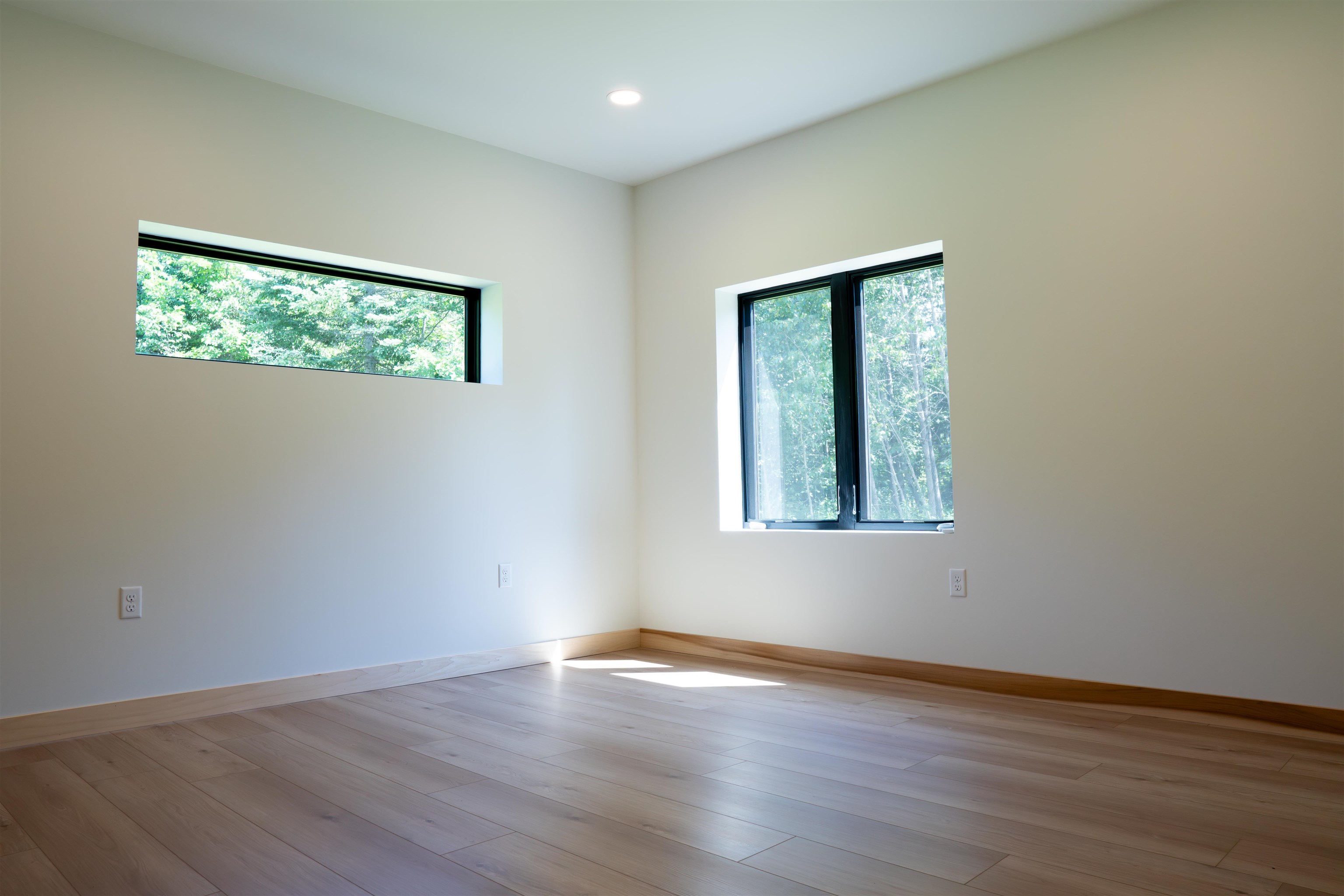 23190 Sawgrass Road Cornucopia, WI 54827 - Photo 13 of 23 Unfurnished room with hardwood / wood-style floors