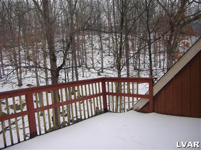 952 Canterbury Road Bushkill, PA 18324 - Photo 4 of 11 a view of wooden balcony