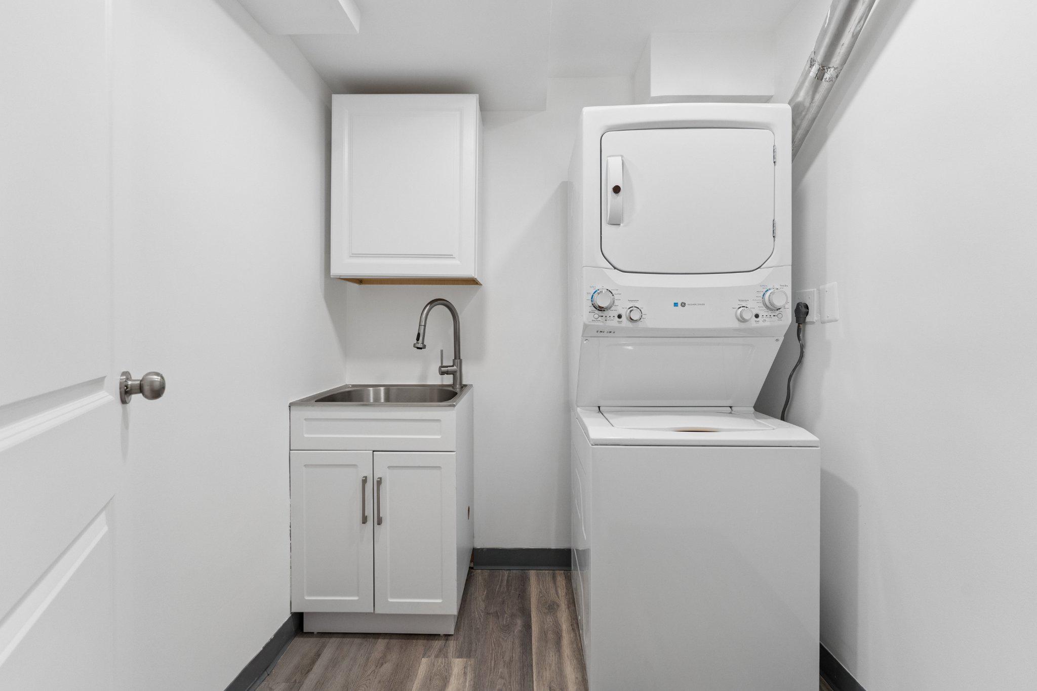 3219 Fox Mill Road Oakton, VA 22124 - Photo 49 of 87 1st laundry space with sleek design.