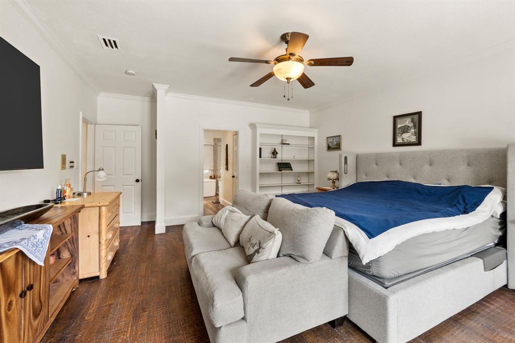 11 Country Ridge Road Melissa, TX 75454 - Photo 18 of 40 The primary suite comes complete with built in bookshelves space for a seating area and patio doors leading to the pool.