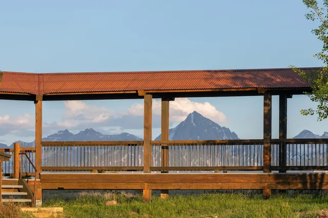 a view of swimming pool from a balcony