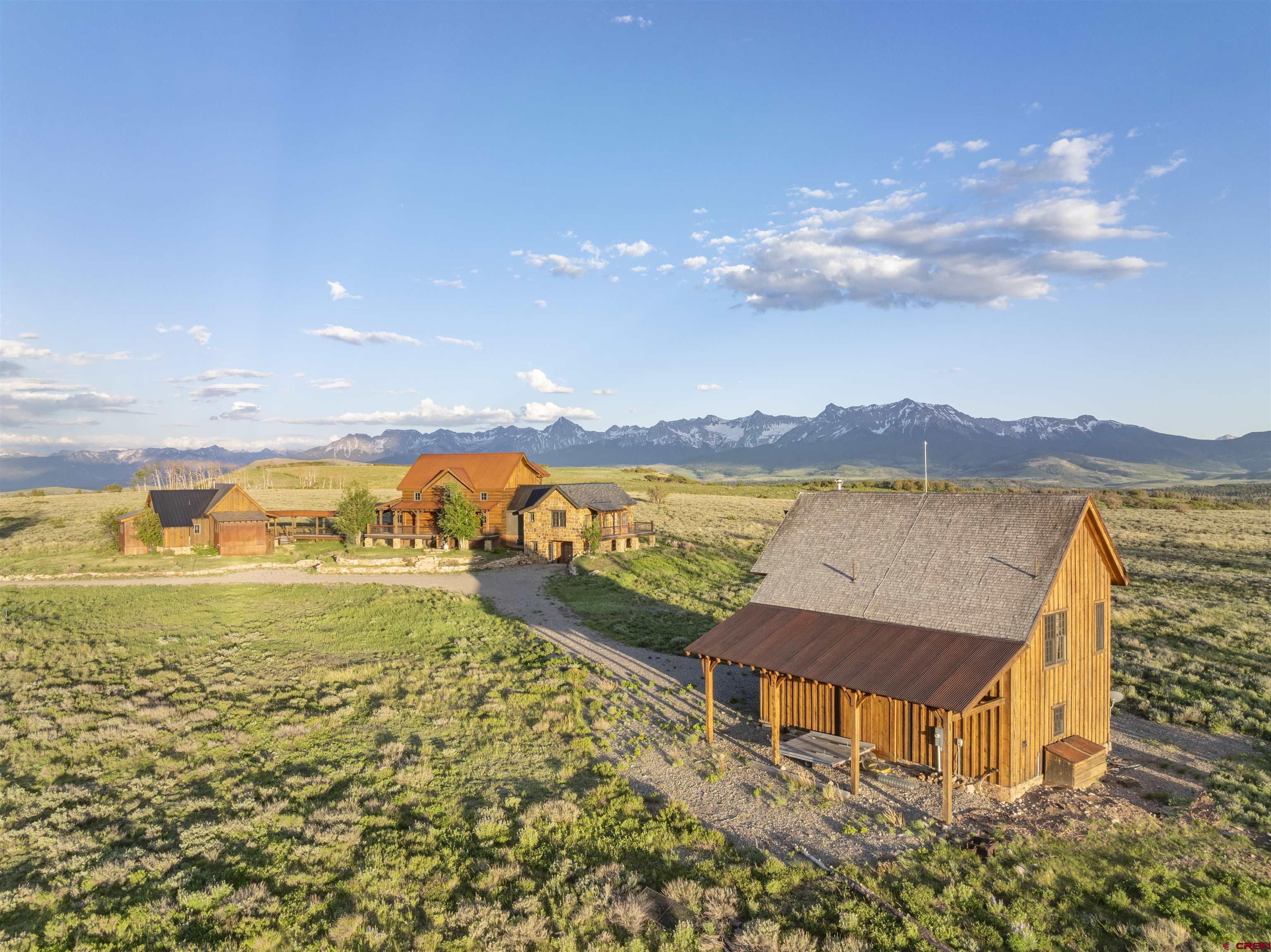 842 Ranch Road Ridgway, CO 81432 - Photo 28 of 35 a view of a lake with a mountain
