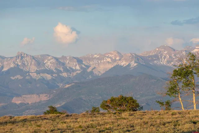 a view of ocean and a mountain