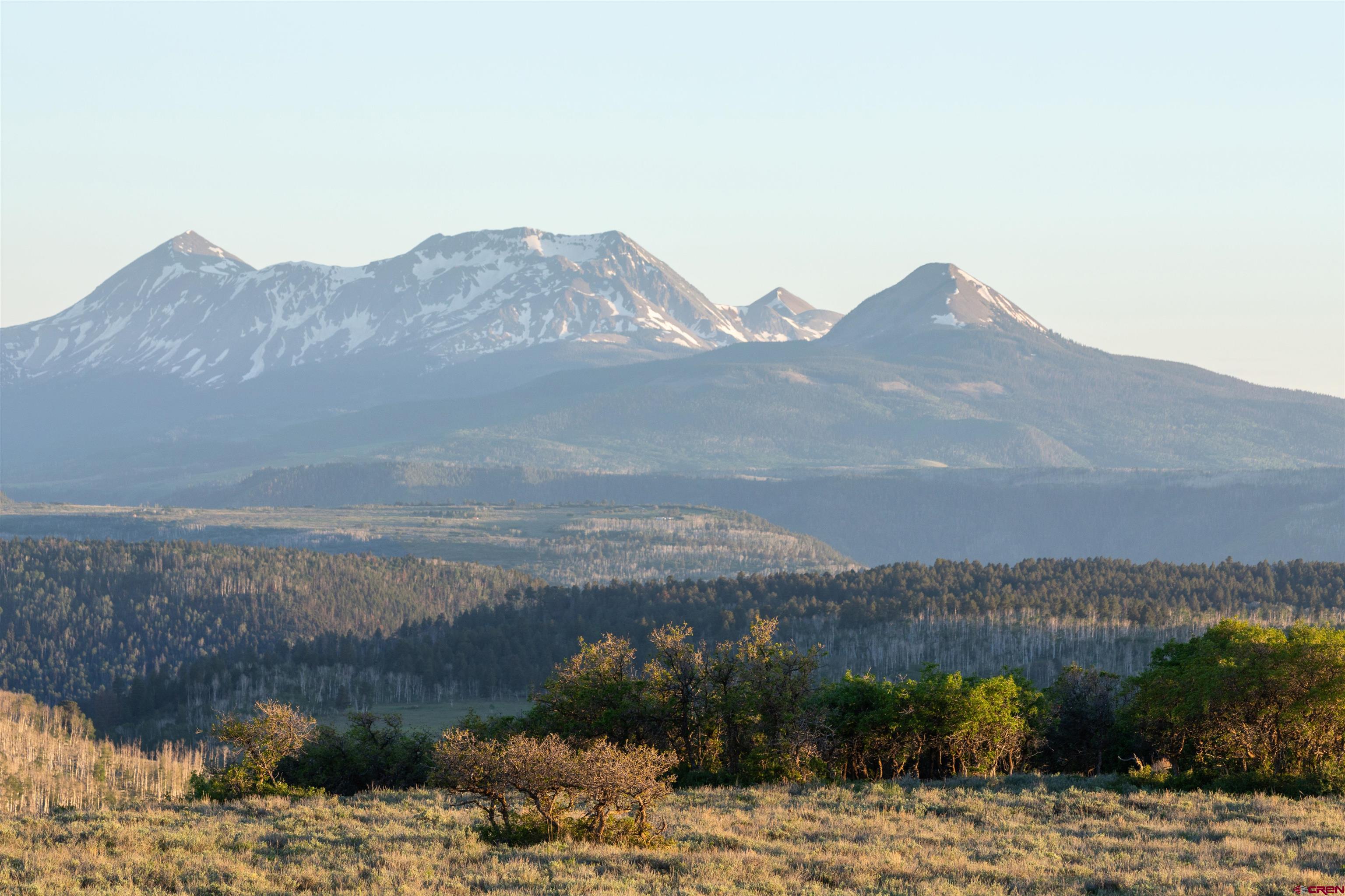 842 Ranch Road Ridgway, CO 81432 - Photo 32 of 35 a view of a town with mountains in the background