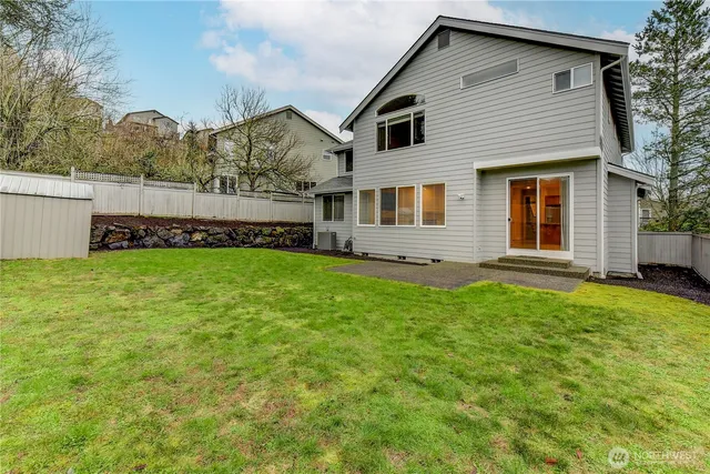 a view of front of house with a yard