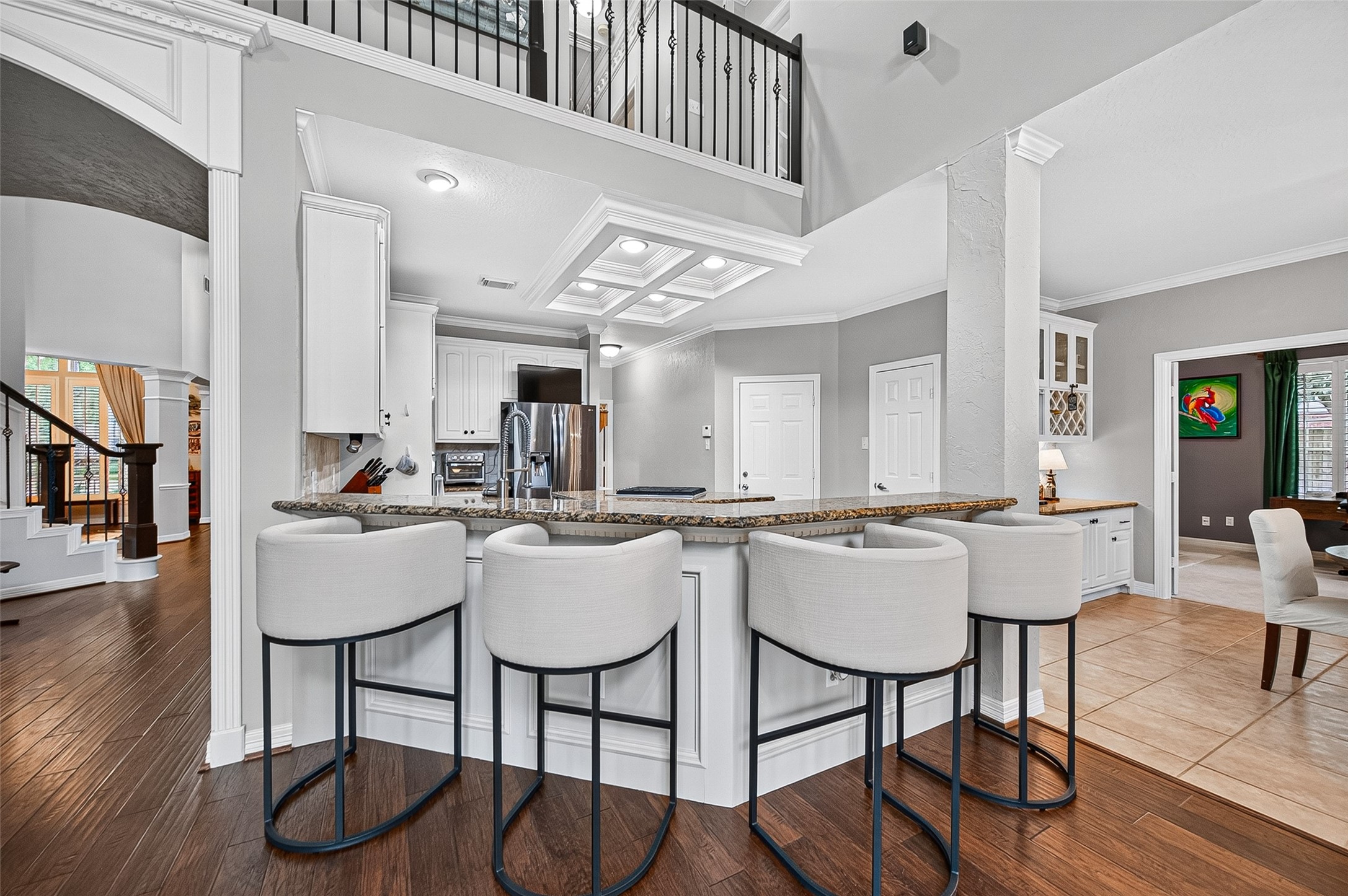 11822 Rue Beaujon Court Tomball, TX 77377 - Photo 17 of 50 The kitchen Island offers enough seating for four.