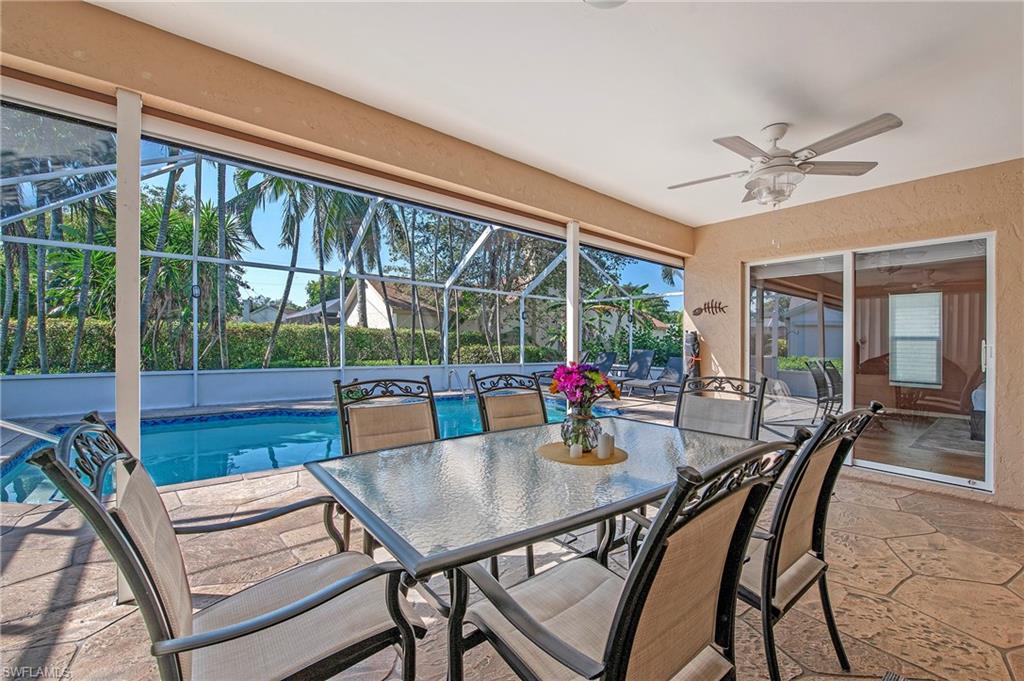 5060 Coldstream Lane Naples, FL 34104 - Photo 3 of 32 Covered outdoor dining area.