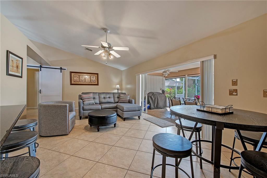 5060 Coldstream Lane Naples, FL 34104 - Photo 10 of 32 2nd living area with bistro table.
