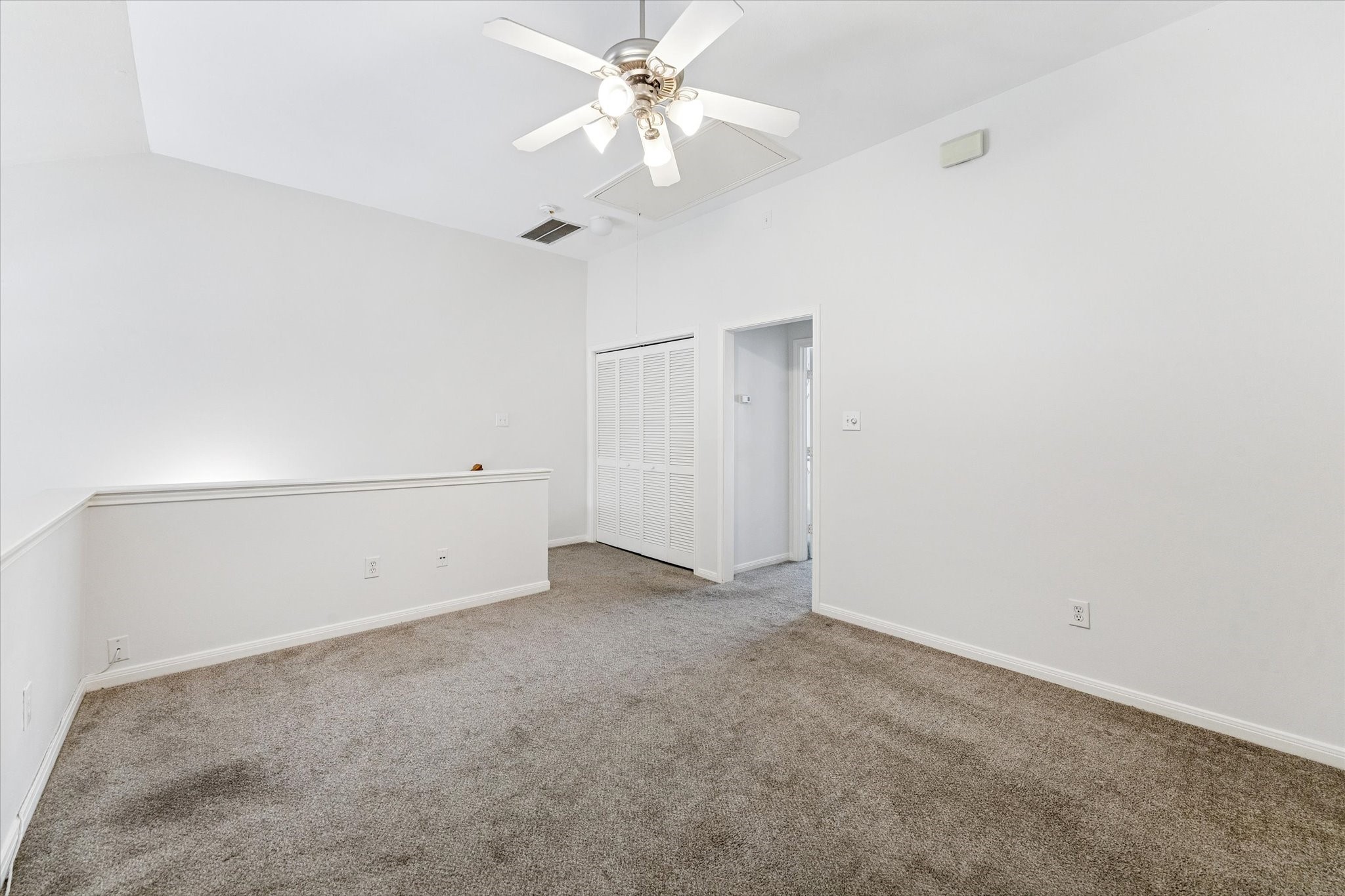 1626 Genesee Street Houston, TX 77006 - Photo 16 of 22 an empty room with chandelier fan