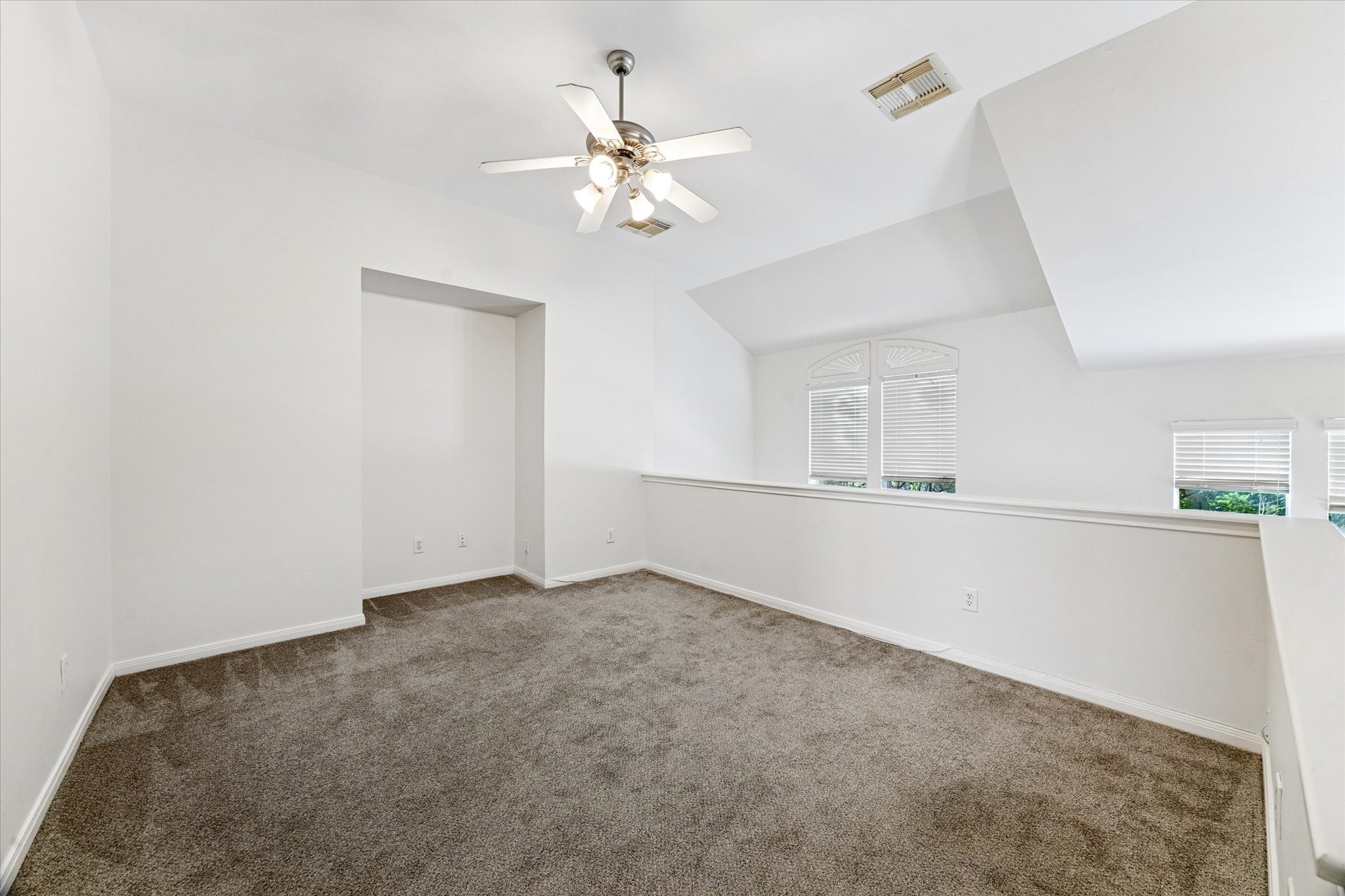 1626 Genesee Street Houston, TX 77006 - Photo 17 of 22 a view of an empty room with chandelier fan