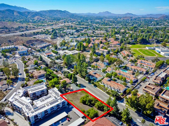 an aerial view of a city with lots of residential buildings