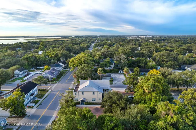 an aerial view of residential house with outdoor space