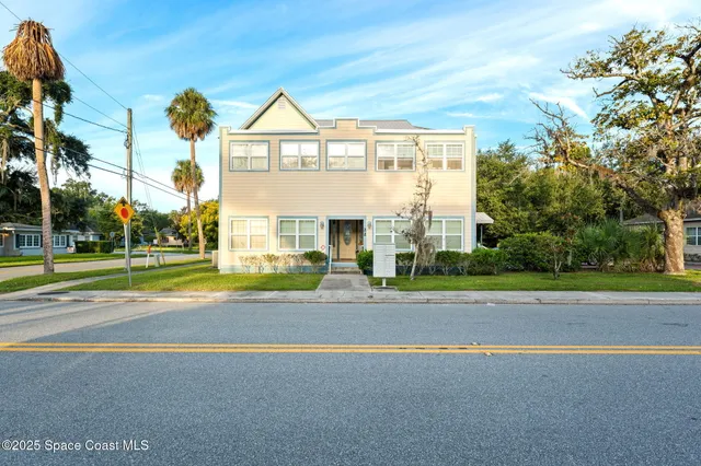 a view of a house with a swimming pool