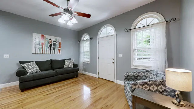 a living room with furniture and a window