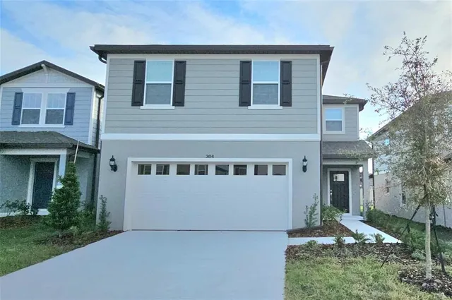 a house view with a garden space