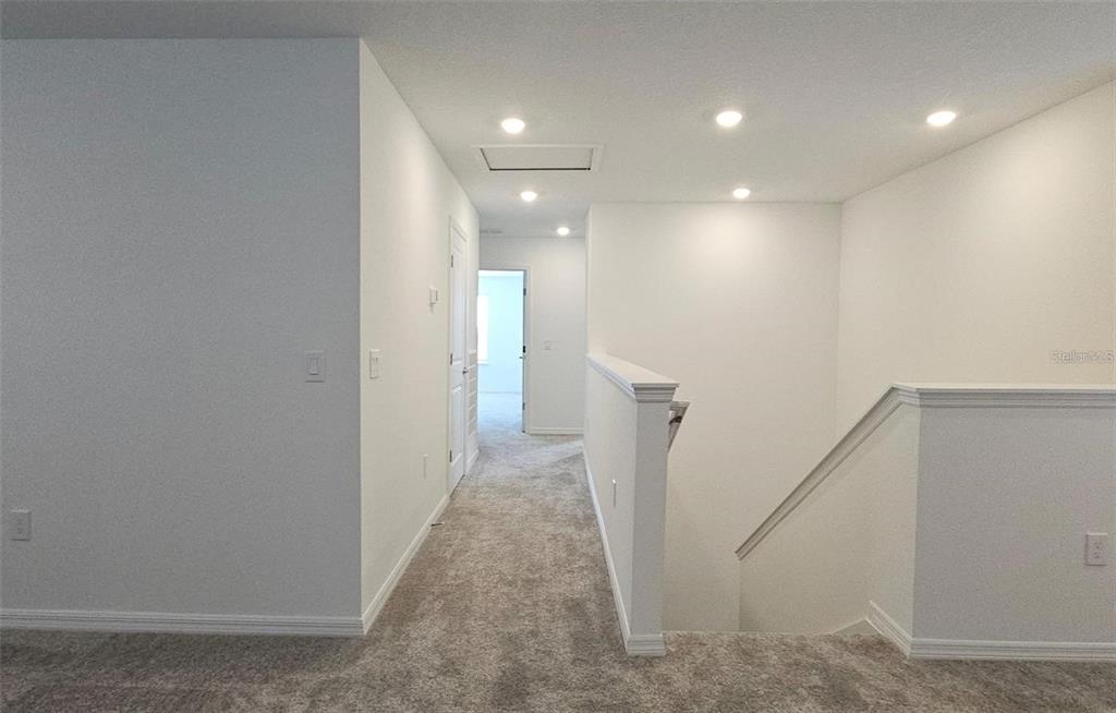 304 Woodsage Place Lake Alfred, FL 33850 - Photo 16 of 30 a view of a hallway