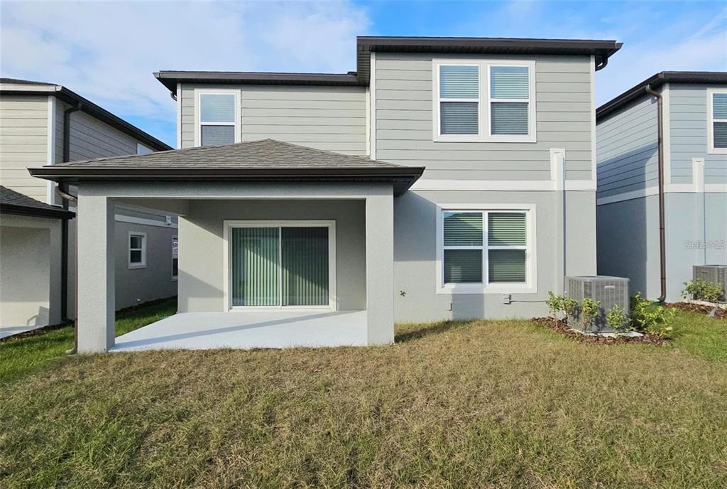 304 Woodsage Place Lake Alfred, FL 33850 - Photo 3 of 30 a front view of a house