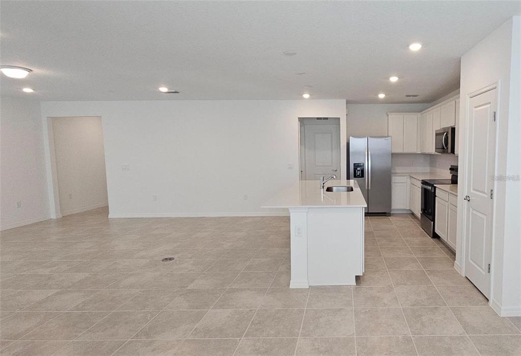 304 Woodsage Place Lake Alfred, FL 33850 - Photo 9 of 30 a view of a kitchen with a sink