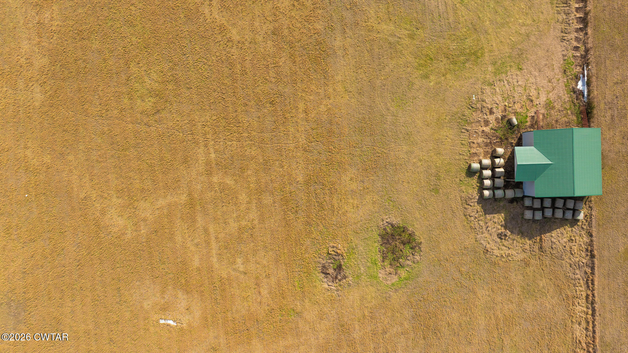 206 Hopewell Street Gleason, TN 38229 - Photo 12 of 17 a bathroom with a shower curtain