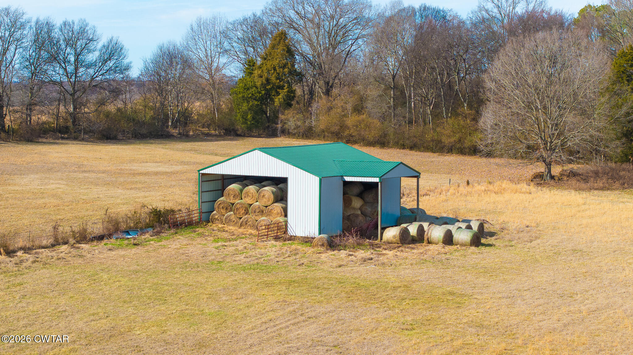 206 Hopewell Street Gleason, TN 38229 - Photo 13 of 17 a view of a house with a yard covered with snow