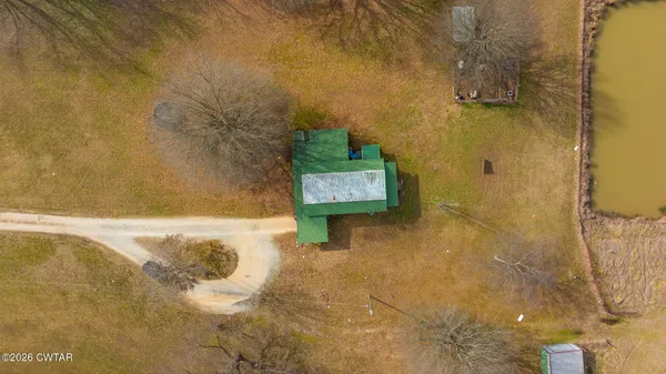 a view of a lake with a big yard
