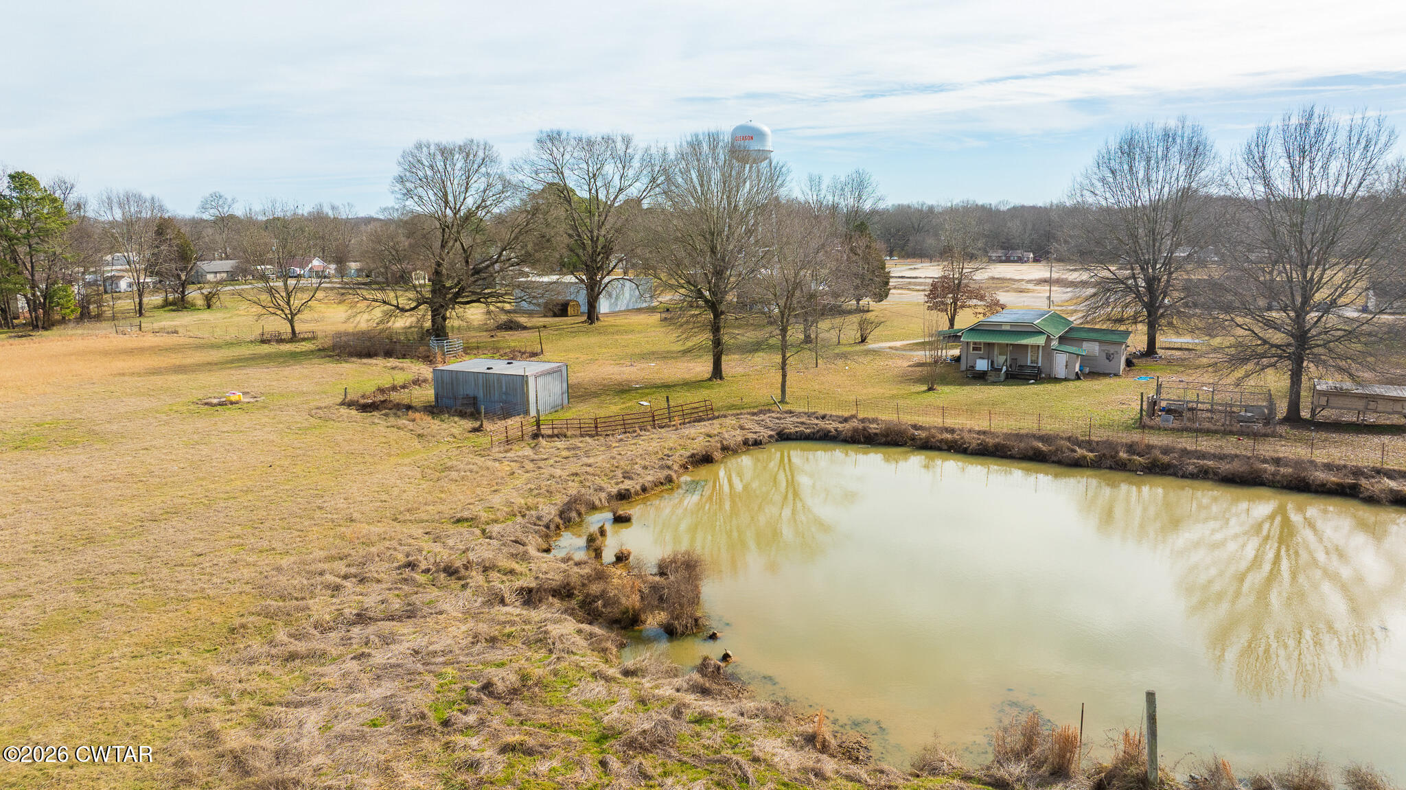 206 Hopewell Street Gleason, TN 38229 - Photo 16 of 17 a view of a lake with a mountain
