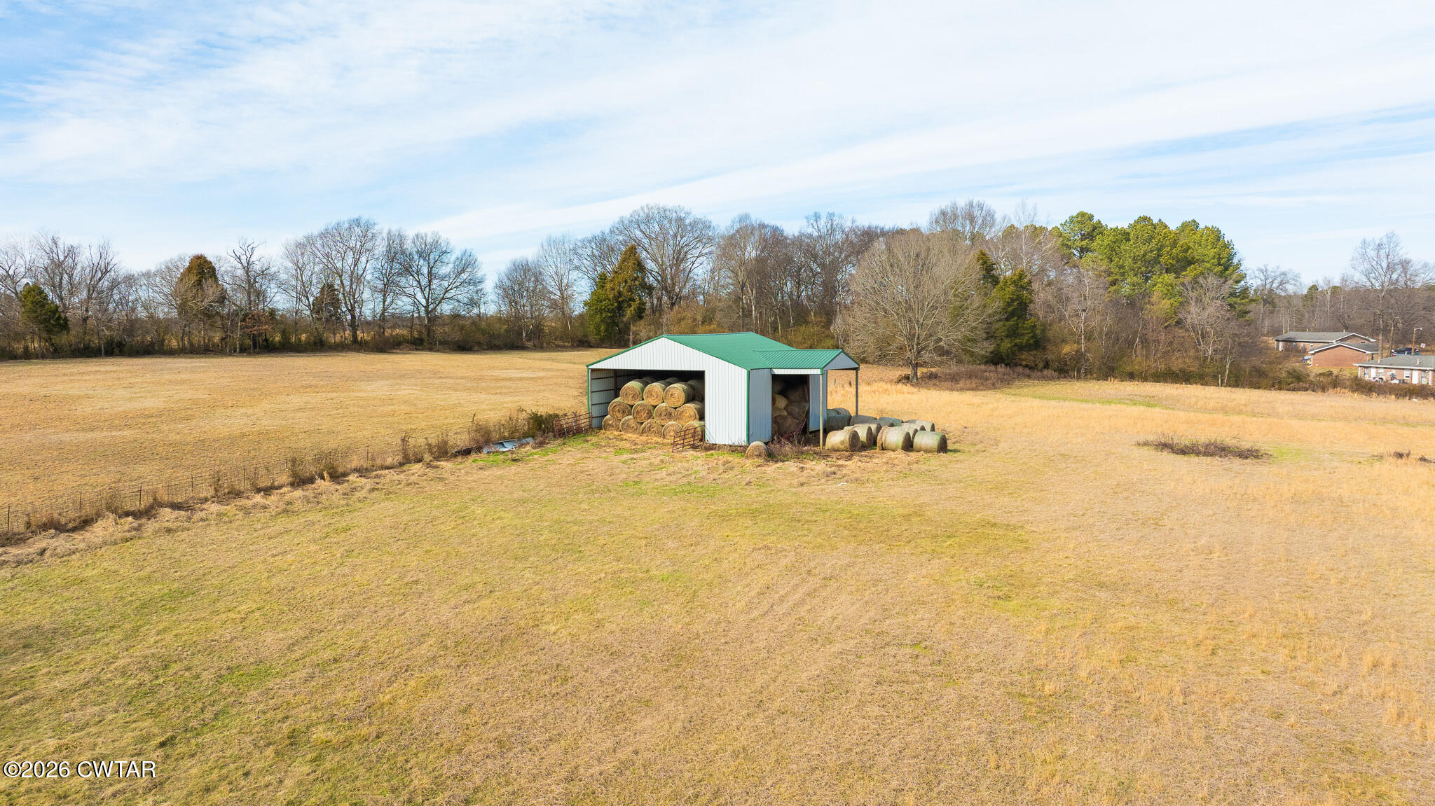 206 Hopewell Street Gleason, TN 38229 - Photo 17 of 17 a view of a lake with a big yard