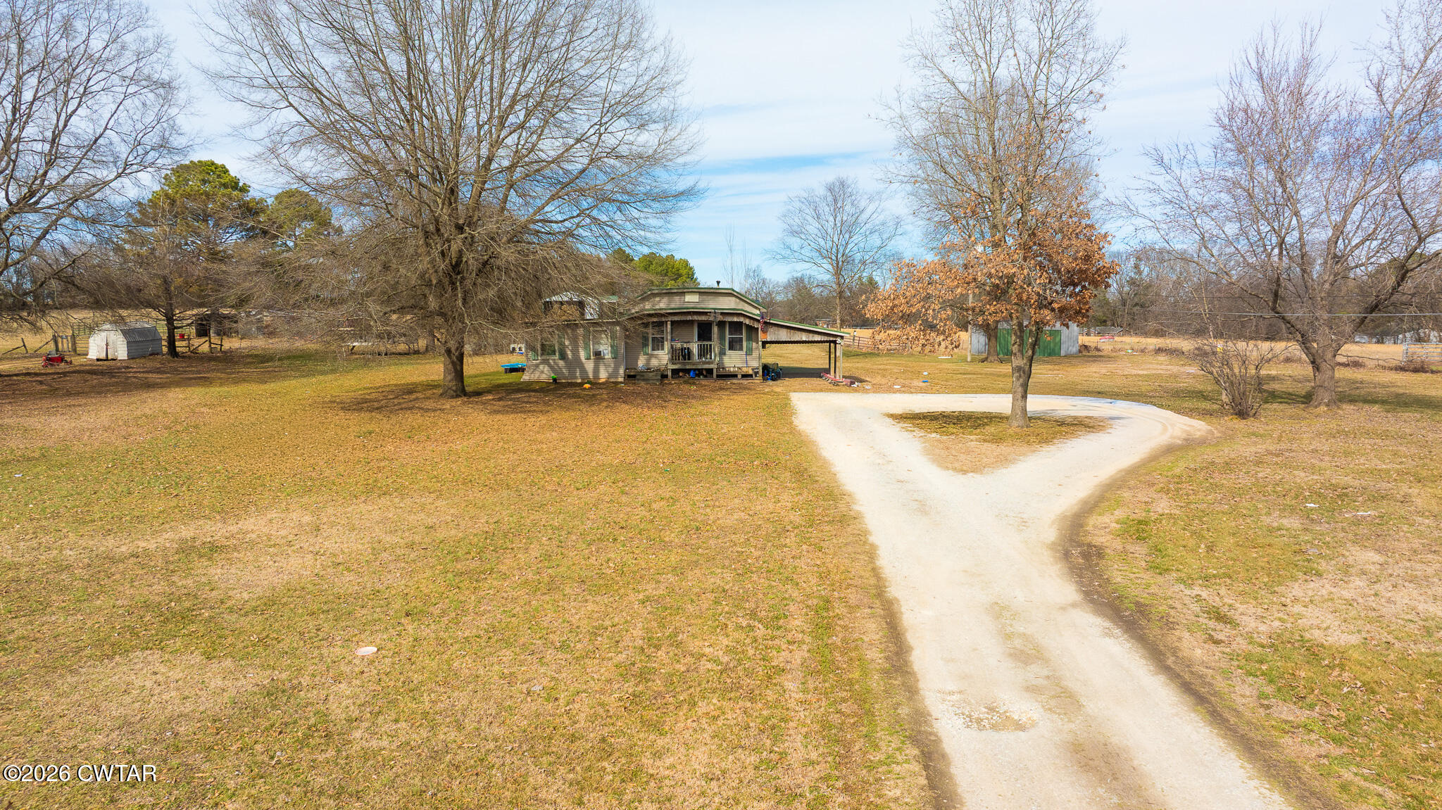 206 Hopewell Street Gleason, TN 38229 - Photo 2 of 17 a view of a swimming pool with an outdoor space