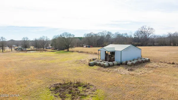 a view of a lake with a big yard