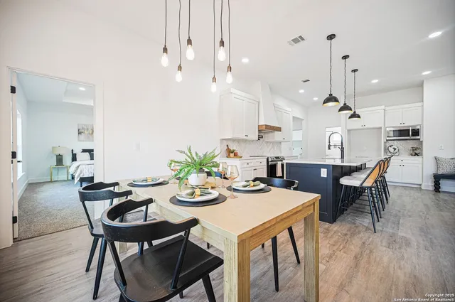 a bathroom with a sink a toilet and a bathtub