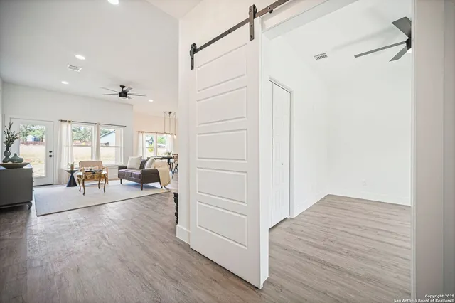 an aerial view of a houses with a lake view